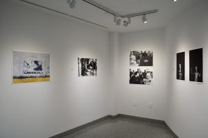Installation view of six photographs.